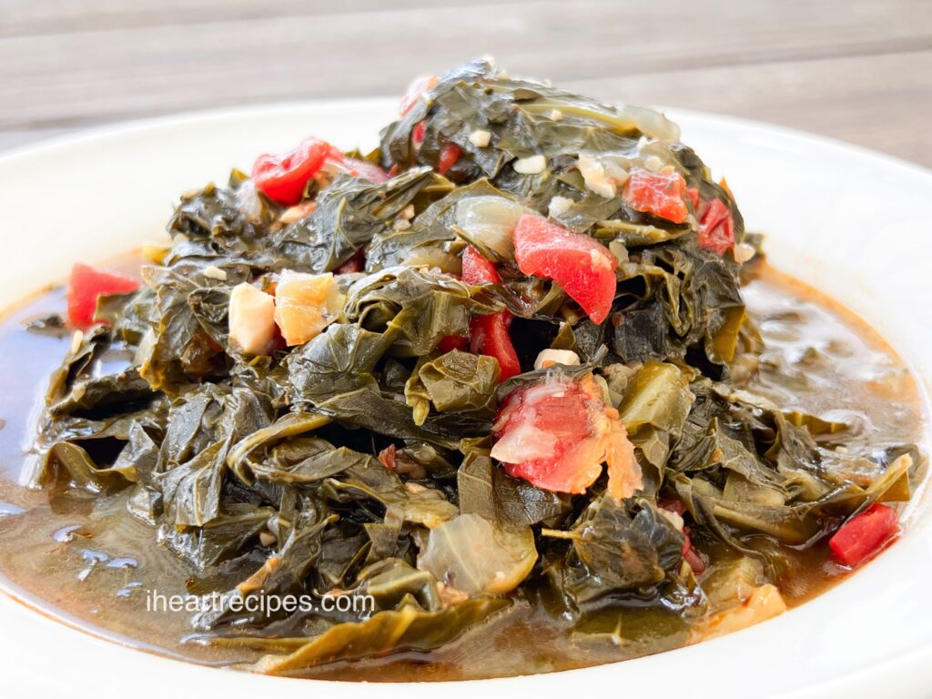 Southern Vegetarian Mixed Greens piled high in a round bowl.